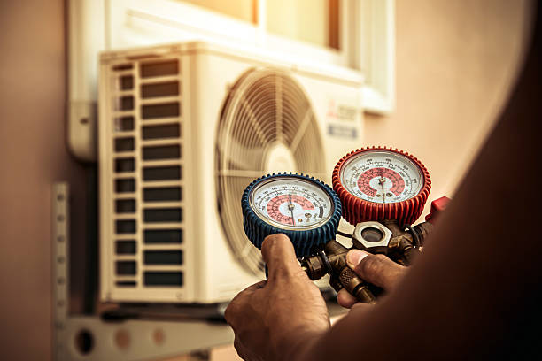 Professional Air Conditioning Service technician working in Ashfield, PA